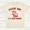 Every Day Is a New Horror Vintage Shirt Retro Cartoon Cabybara T Shirt Weird T Shirt Cowboy Cabybara T Shirt Fun Gift Unisex Shirt Natural S 1